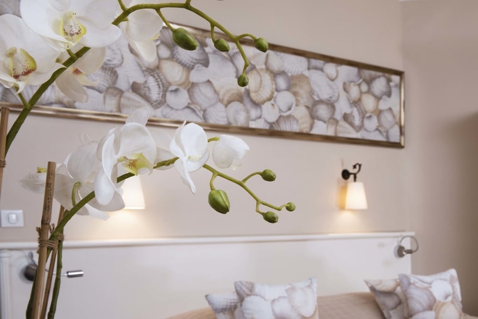 Imagen de la habitación del Hotel Le Central, Trouville-Sur-Mer. Foto 15