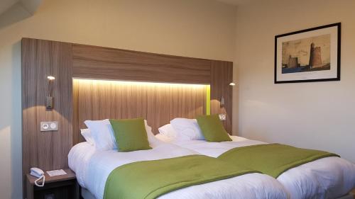 Imagen de la habitación del Hotel Le Cercle. Foto 8