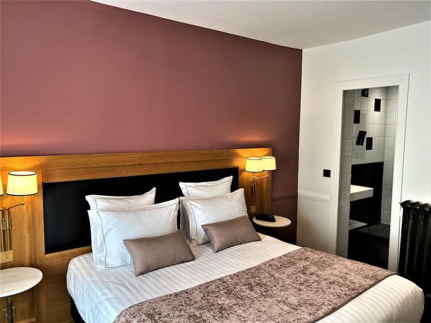 Imagen de la habitación del Hotel Le Cercle Tour Eiffel. Foto 5