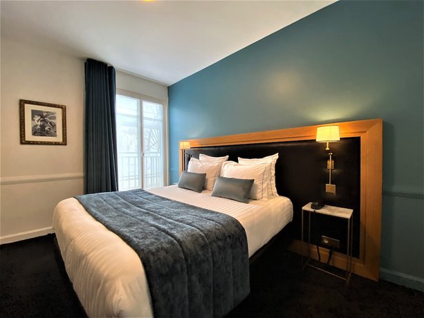 Imagen de la habitación del Hotel Le Cercle Tour Eiffel. Foto 7