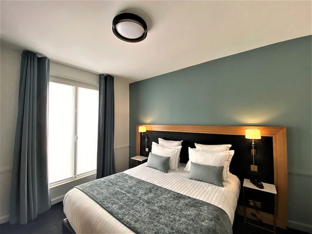 Imagen de la habitación del Hotel Le Cercle Tour Eiffel. Foto 8