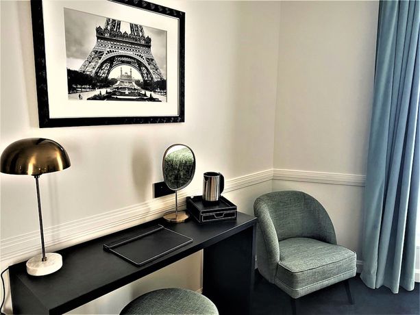 Imagen de la habitación del Hotel Le Cercle Tour Eiffel. Foto 12