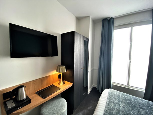 Imagen de la habitación del Hotel Le Cercle Tour Eiffel. Foto 15