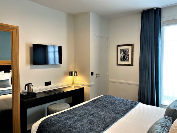 Imagen de la habitación del Hotel Le Cercle Tour Eiffel. Foto 16