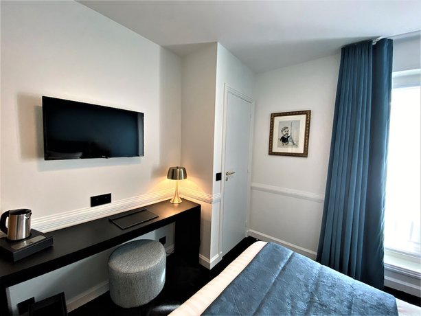 Imagen de la habitación del Hotel Le Cercle Tour Eiffel. Foto 17