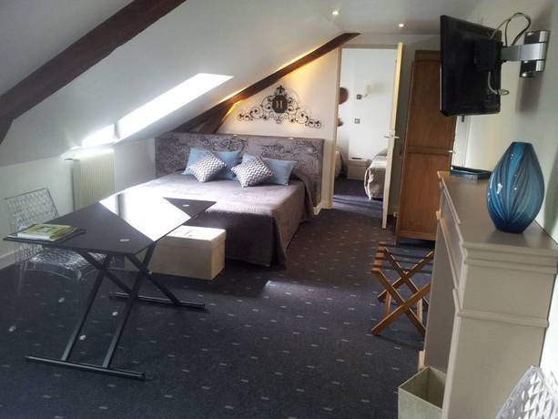 Imagen de la habitación del Hotel Le Cerf. Foto 2