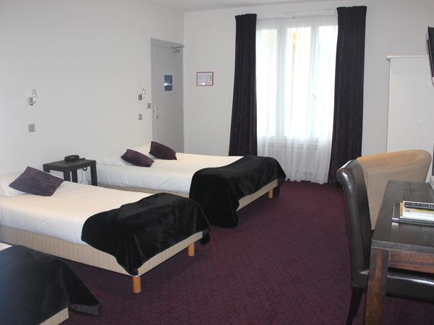 Imagen de la habitación del Hotel Le Cerf. Foto 9