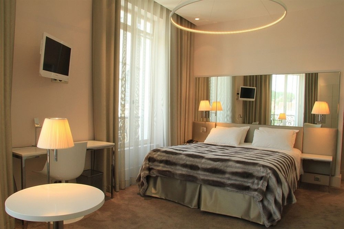 Imagen de la habitación del Hotel Le Cesar. Foto 6