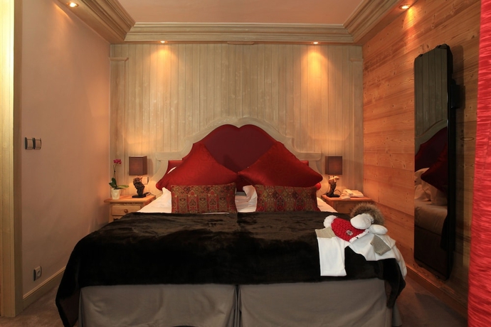 Imagen de la habitación del Hotel Le Chabichou. Foto 16