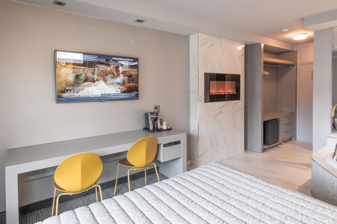 Imagen de la habitación del Hotel Le Chabrol and Suites. Foto 3