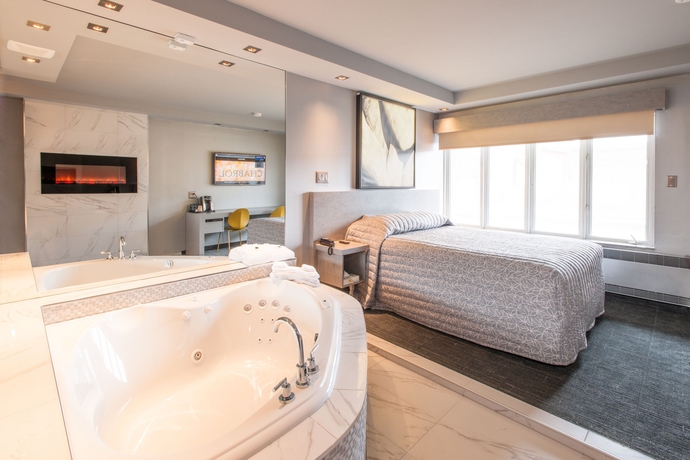 Imagen de la habitación del Hotel Le Chabrol and Suites. Foto 10