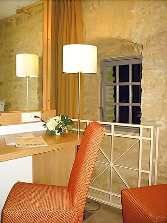 Imagen de la habitación del Hotel Le Ch&acirc;teau Fort. Foto 10