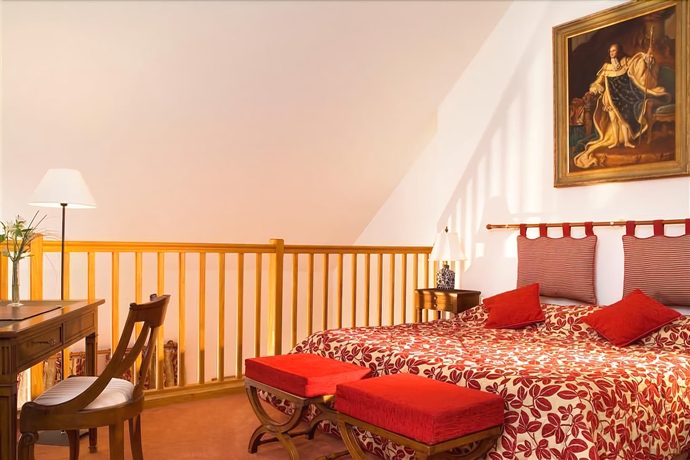 Imagen de la habitación del Hotel Le Ch&acirc;teau Fort. Foto 13