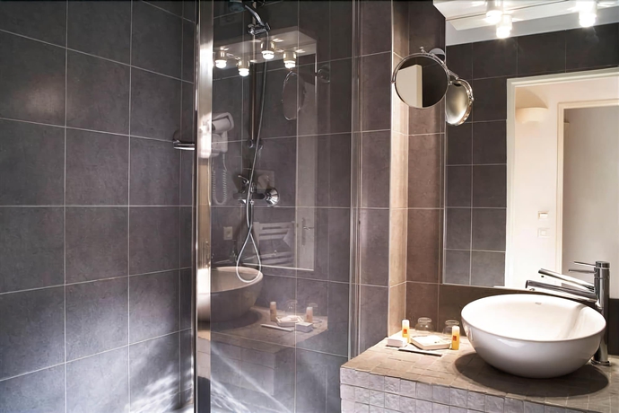 Imagen de la habitación del Hotel Le Ch&acirc;teau Fort. Foto 14