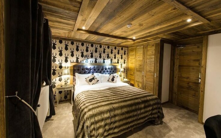 Imagen de la habitación del Hotel Le Chalet Blanc, Megeve. Foto 20