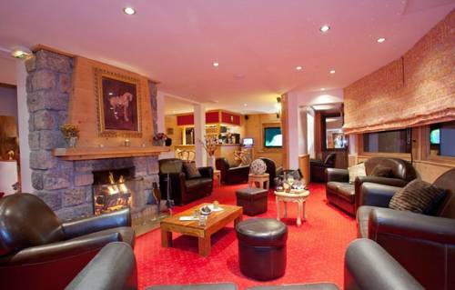 Imagen de la habitación del Hotel Le Chalet D'auron. Foto 2