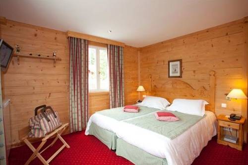 Imagen de la habitación del Hotel Le Chalet D'auron. Foto 3