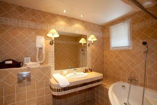 Imagen de la habitación del Hotel Le Chalet D'auron. Foto 5