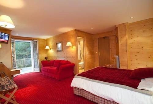 Imagen de la habitación del Hotel Le Chalet D'auron. Foto 6