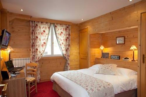 Imagen de la habitación del Hotel Le Chalet D'auron. Foto 12