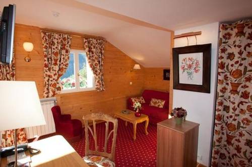 Imagen de la habitación del Hotel Le Chalet D'auron. Foto 13
