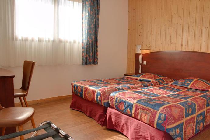 Imagen de la habitación del Hotel Le Chalet De La Forêt. Foto 5