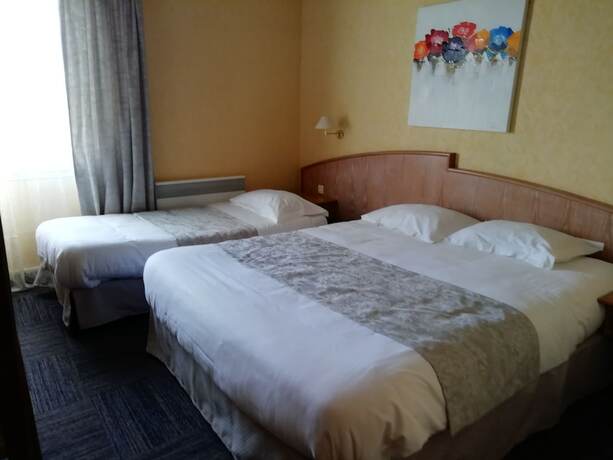 Imagen de la habitación del Hotel Le Chalet Fleuri. Foto 17