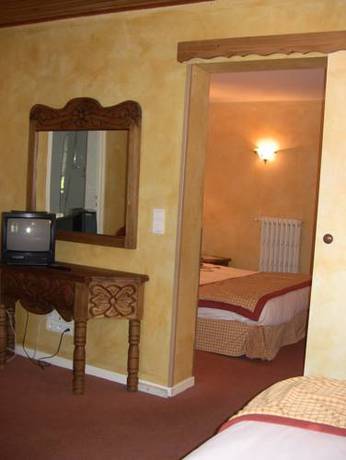 Imagen de la habitación del Hotel Le Chalet Suisse. Foto 5
