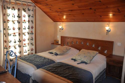 Imagen de la habitación del Hotel Le Chalet Suisse. Foto 9