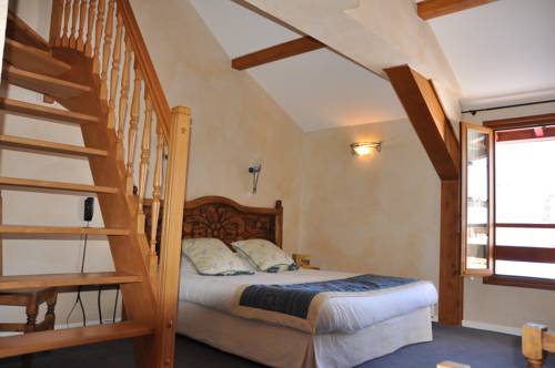 Imagen de la habitación del Hotel Le Chalet Suisse. Foto 11