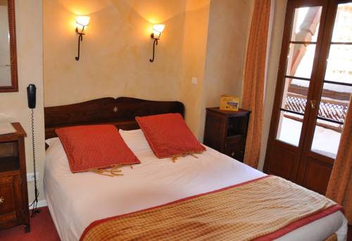 Imagen de la habitación del Hotel Le Chalet Suisse. Foto 13