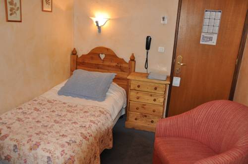 Imagen de la habitación del Hotel Le Chalet Suisse. Foto 16