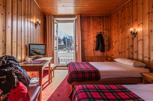 Imagen de la habitación del Hotel Le Chamonix, Chamonix Mont-Blanc. Foto 11