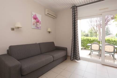 Imagen de la habitación del Hotel Le Champ D'eysson. Foto 7