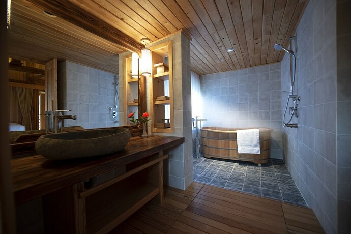 Imagen de la habitación del Hotel Le Champ Tu Le Resort. Foto 23