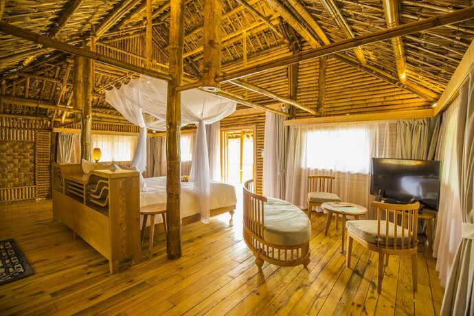 Imagen de la habitación del Hotel Le Champ Tu Le Resort. Foto 26