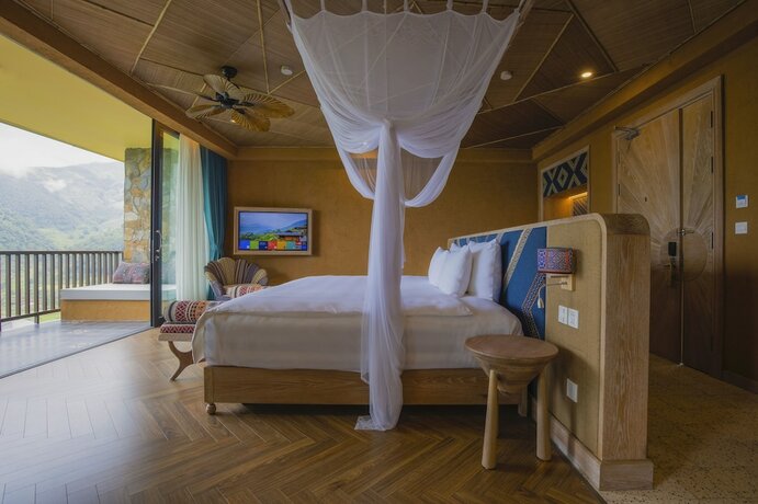 Imagen de la habitación del Hotel Le Champ Tu Le Resort. Foto 30