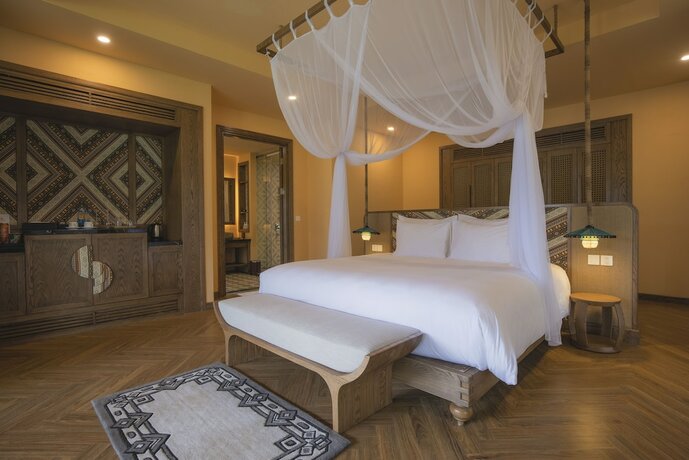 Imagen de la habitación del Hotel Le Champ Tu Le Resort. Foto 33