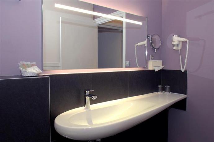 Imagen de la habitación del Hotel Le Champlain. Foto 8