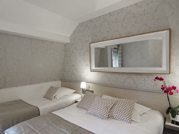 Imagen de la habitación del Hotel Le Chantereigne. Foto 6