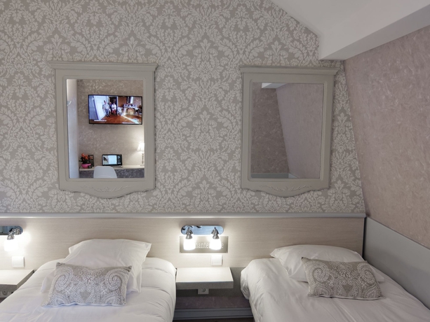 Imagen de la habitación del Hotel Le Chantereigne. Foto 8