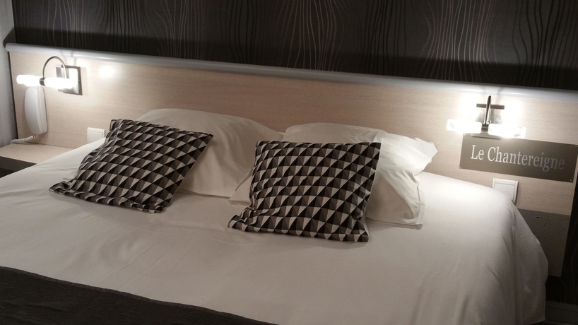Imagen de la habitación del Hotel Le Chantereigne. Foto 13