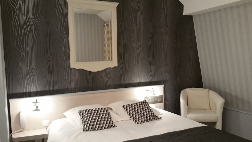 Imagen de la habitación del Hotel Le Chantereigne. Foto 14
