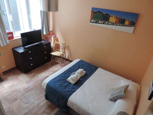 Imagen de la habitación del Hotel Le Chantilly. Foto 11