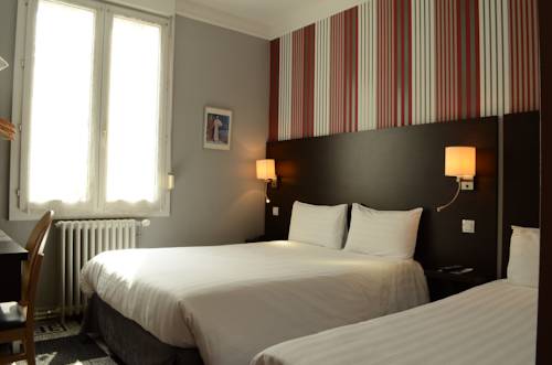 Imagen de la habitación del Hotel Le Charleston. Foto 6