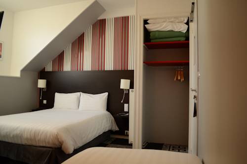 Imagen de la habitación del Hotel Le Charleston. Foto 7