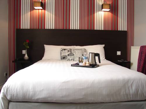 Imagen de la habitación del Hotel Le Charleston. Foto 9