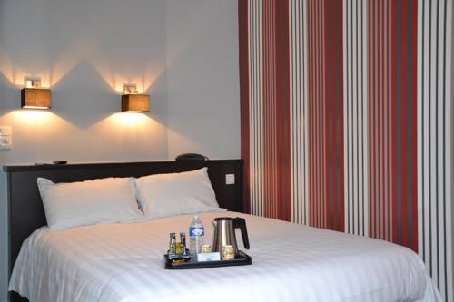 Imagen de la habitación del Hotel Le Charleston. Foto 10