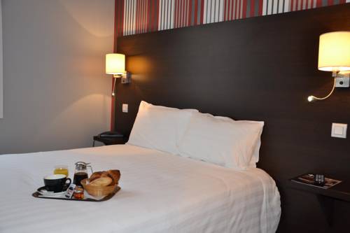 Imagen de la habitación del Hotel Le Charleston. Foto 11