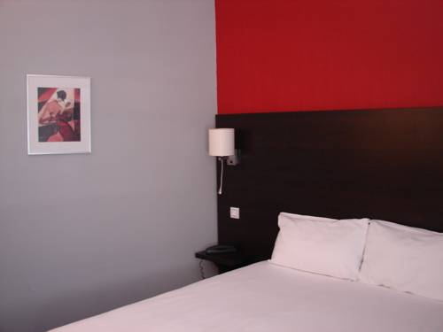 Imagen de la habitación del Hotel Le Charleston. Foto 12